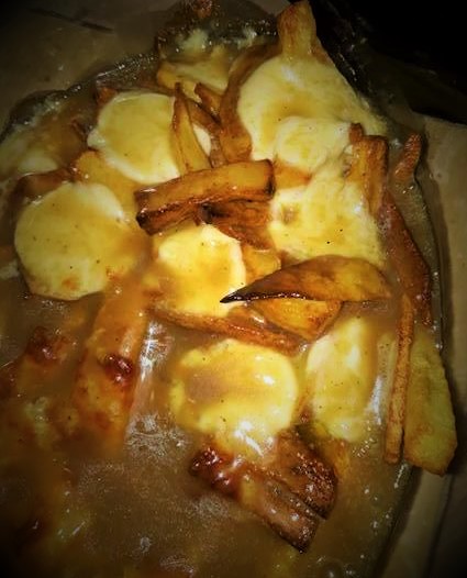 Poutine recipe with potatoes and gravy.