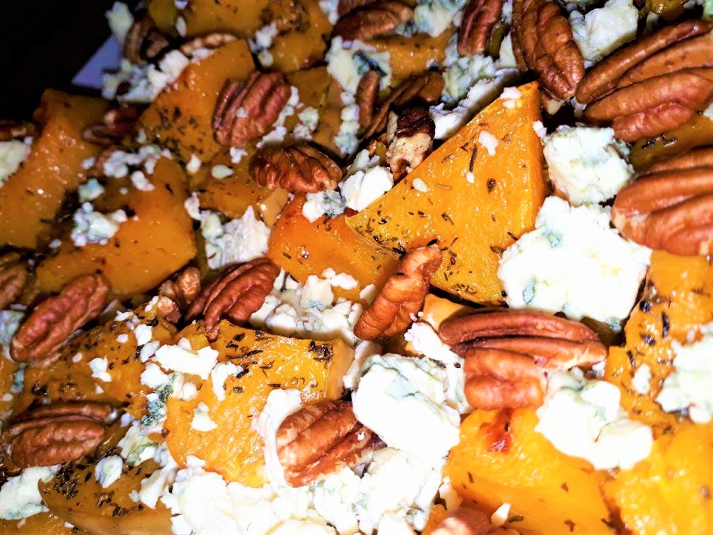 Roasted butternut squash with blue cheese and pecans, perfect for Thanksgiving.